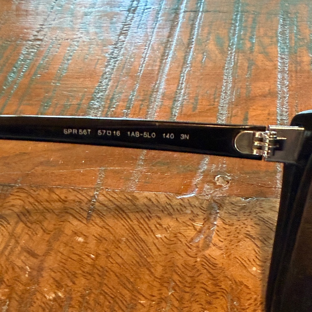 Prada Elegant Black Cat-Eye Women’s Sunglasses - Picture 6 of 7